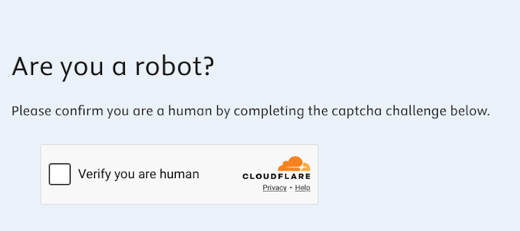 A small tick box next to the words 'Verify you are human'.